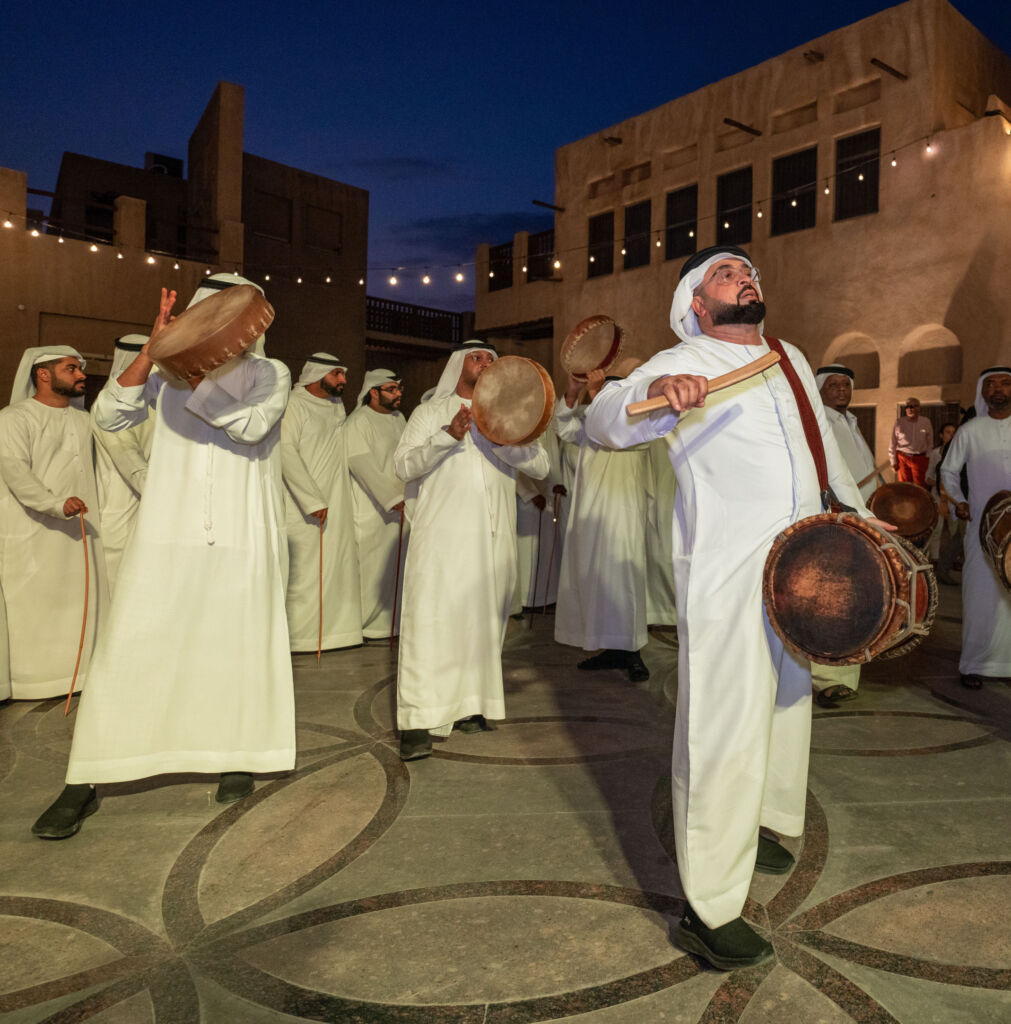 Image of an emirati traditional drummers at an event run by Talents UAE consulting firm